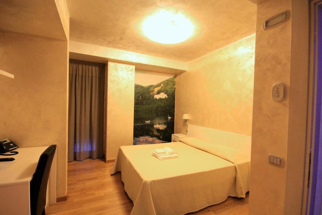 Voodi või voodid majutusasutuse I Rocchi Hotel toas