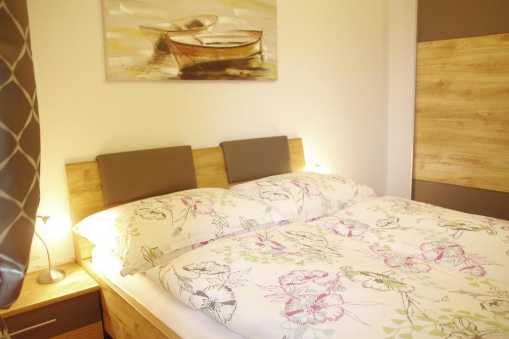 Postel nebo postele na pokoji v ubytování Apartments Fuchs