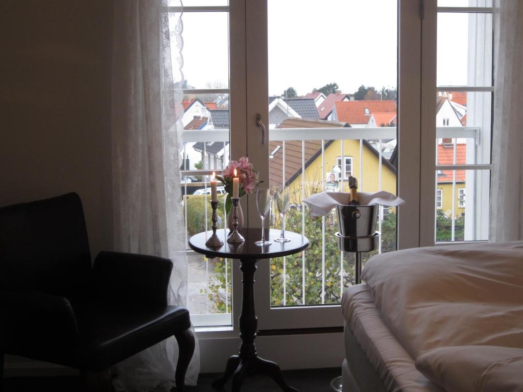 Postel nebo postele na pokoji v ubytování Hotel Gilleleje Strand