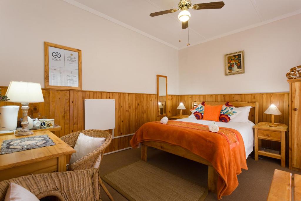 Postel nebo postele na pokoji v ubytování Colesview Guest House