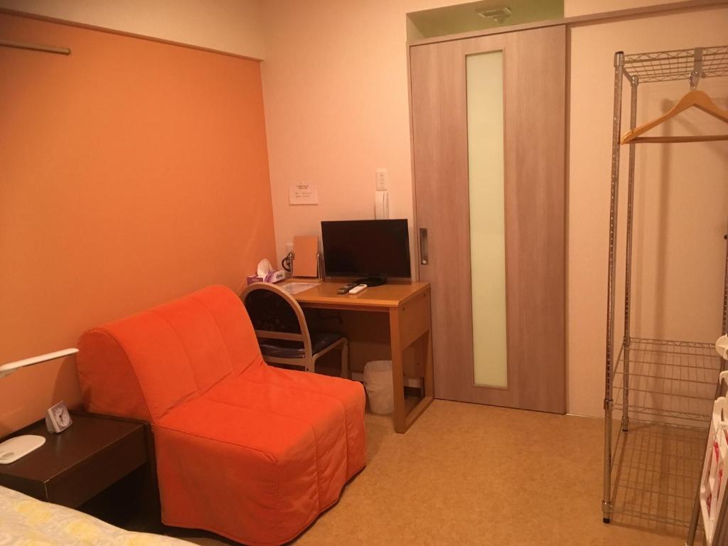 TV a/nebo společenská místnost v ubytování Hotel Asahi Grandeur Fuchu