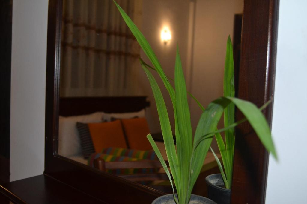 Postel nebo postele na pokoji v ubytování Nice To Meet Home Stay