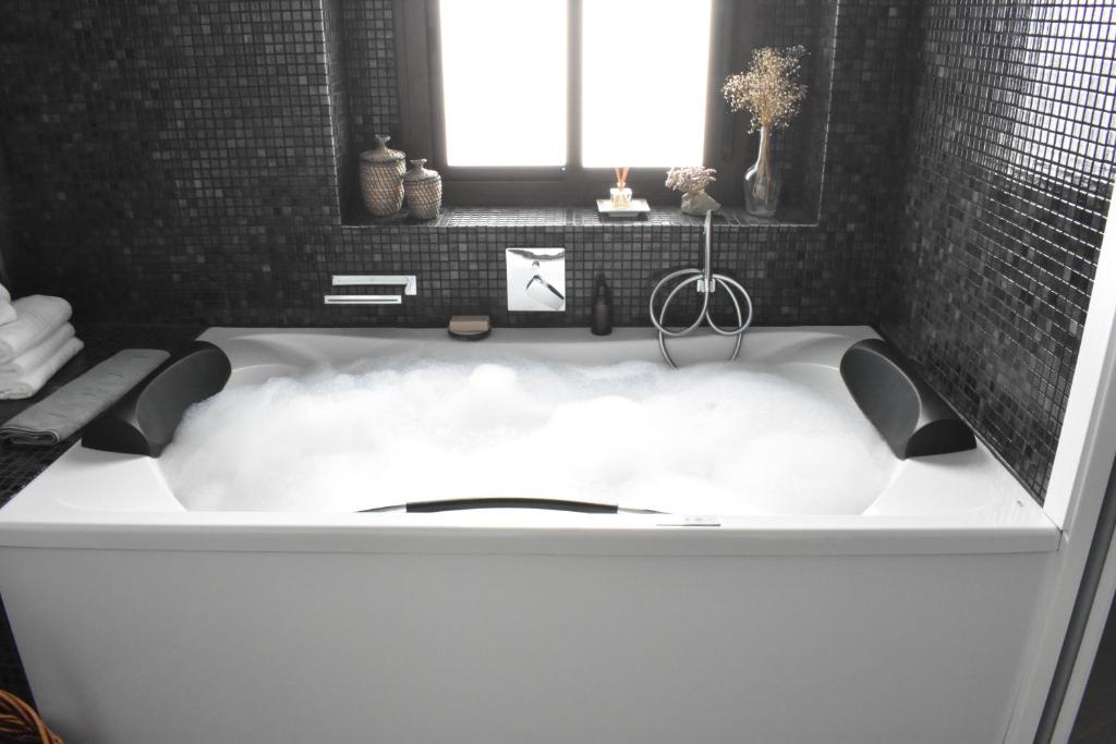 Un baño de Home Apartments Jerez
