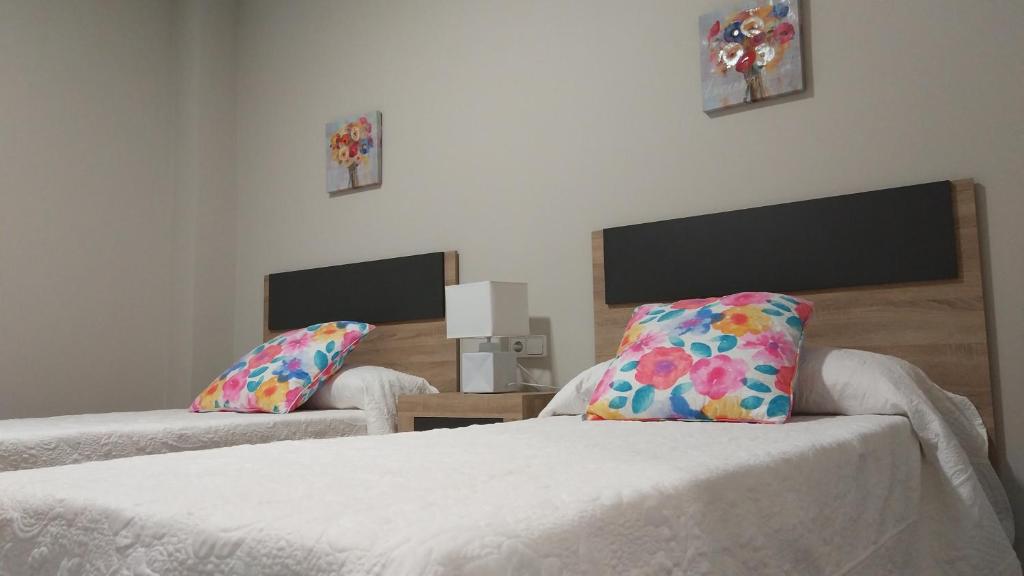 Postel nebo postele na pokoji v ubytování San Anton Centro Apartment
