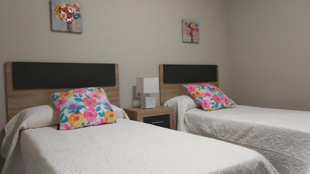 Postel nebo postele na pokoji v ubytování San Anton Centro Apartment