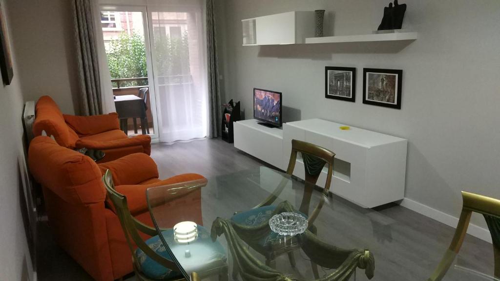 TV a/nebo společenská místnost v ubytování San Anton Centro Apartment