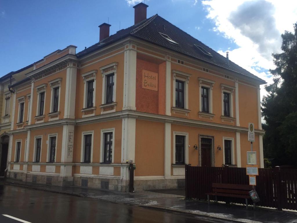 a large building on the side of a street at Hotel Bellini in Leoben