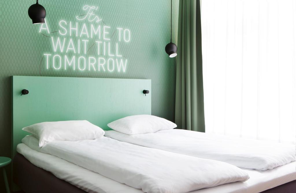 Postel nebo postele na pokoji v ubytování Comfort Hotel Karl Johan