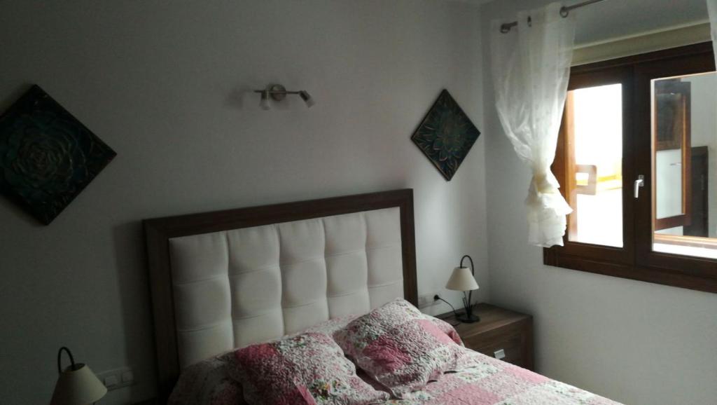 Postel nebo postele na pokoji v ubytování Paraiso Rubicón