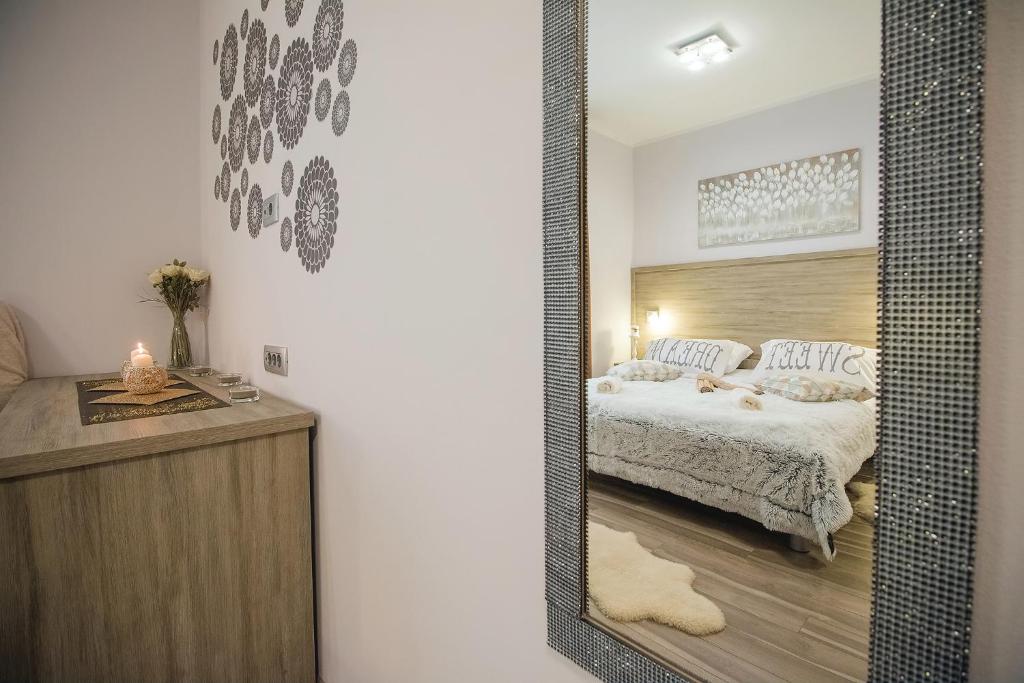 Łóżko lub łóżka w pokoju w obiekcie Holiday Center Ivona