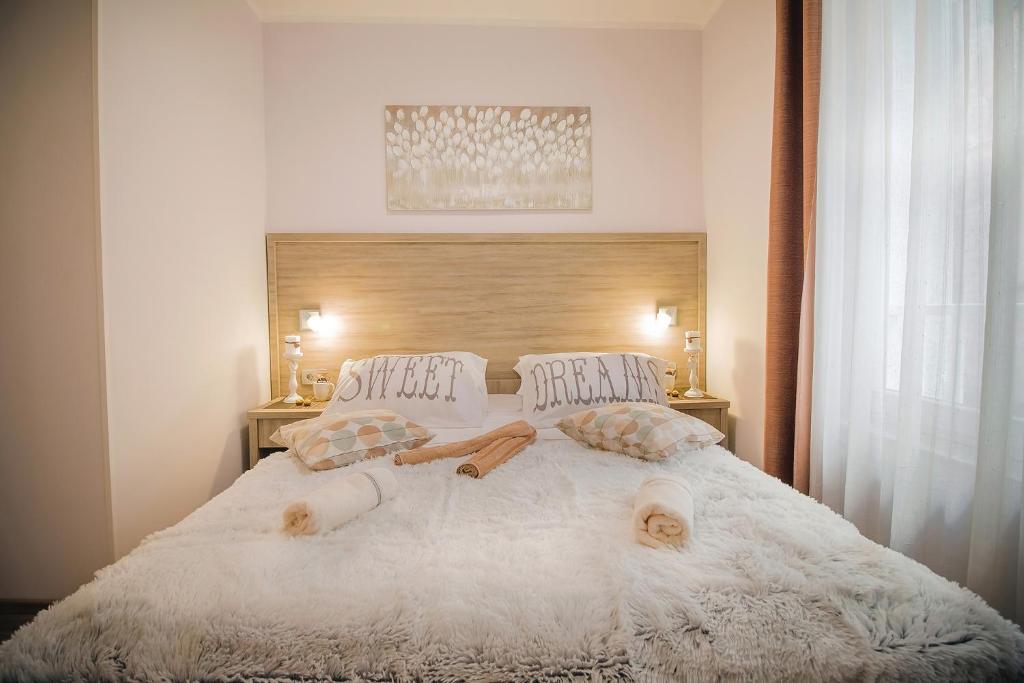 Łóżko lub łóżka w pokoju w obiekcie Holiday Center Ivona