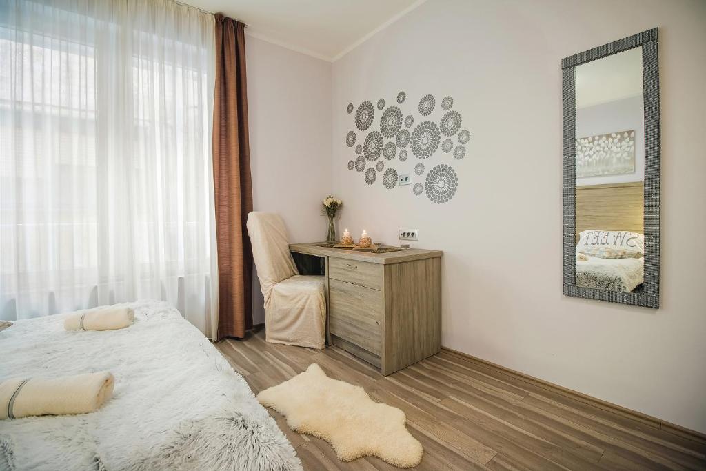 Łóżko lub łóżka w pokoju w obiekcie Holiday Center Ivona