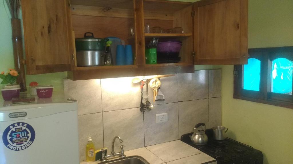 Kuchyň nebo kuchyňský kout v ubytování Estrella del Monte