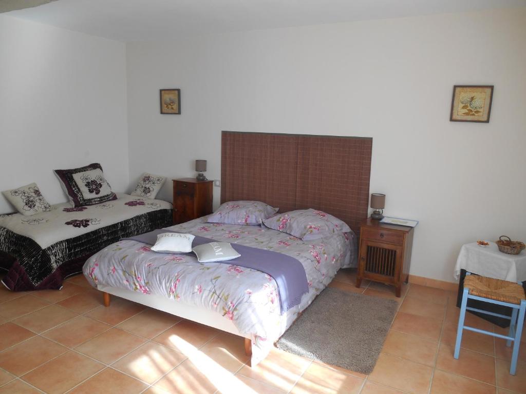 Postel nebo postele na pokoji v ubytování Le Pressoir B&B