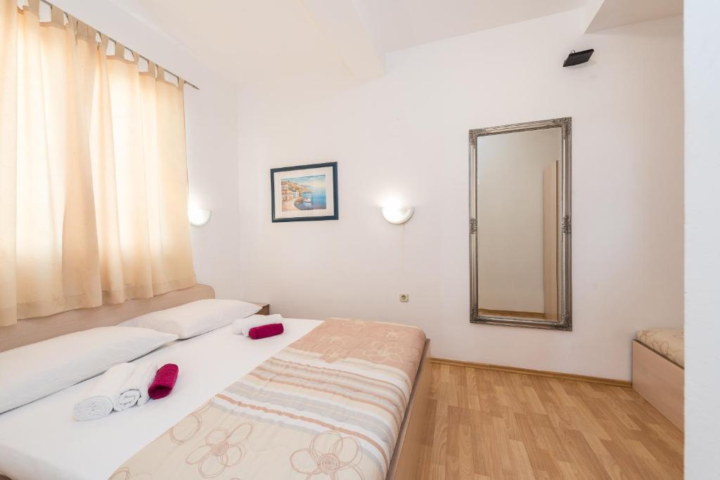 Postel nebo postele na pokoji v ubytování Villa Jurac
