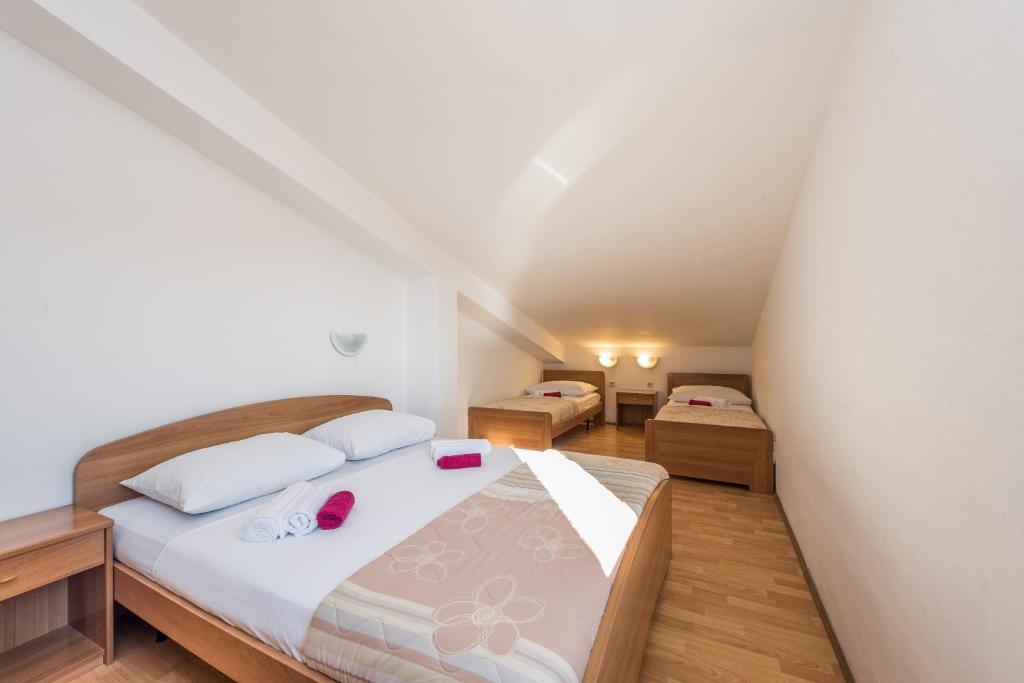 Postel nebo postele na pokoji v ubytování Villa Jurac