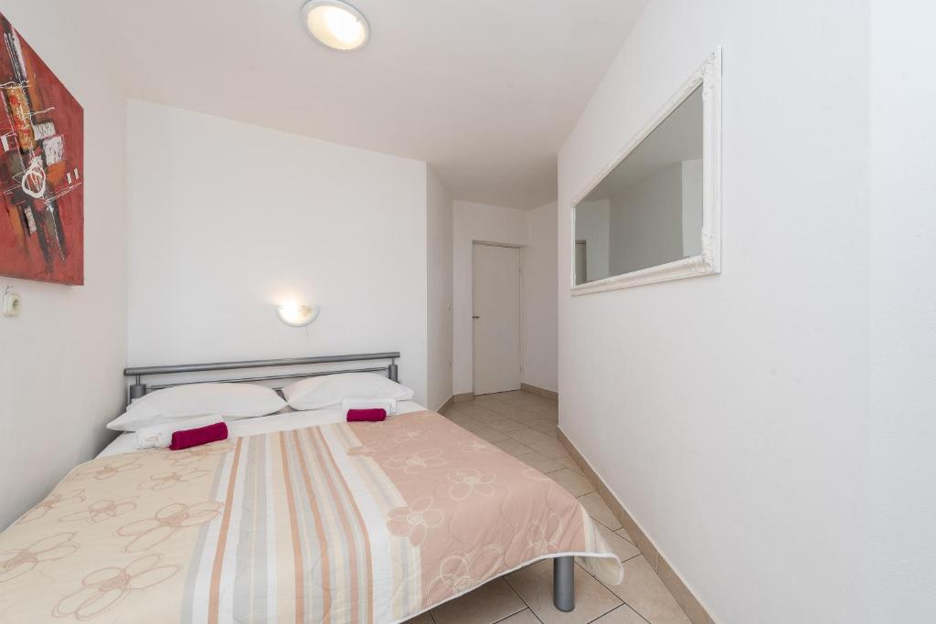 Postel nebo postele na pokoji v ubytování Villa Jurac
