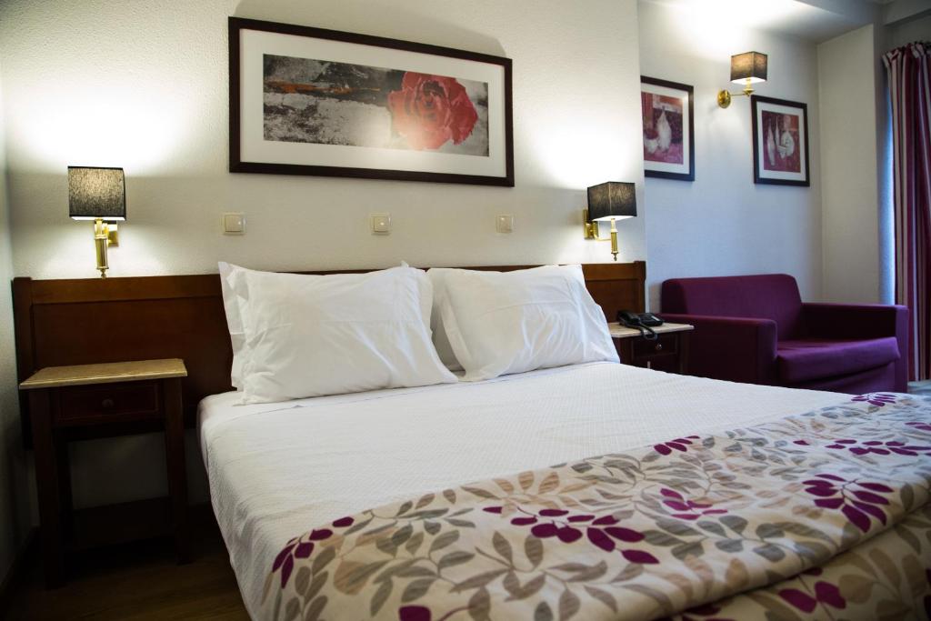Postel nebo postele na pokoji v ubytování Hotel Solaris