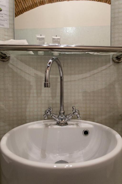 Koupelna v ubytování Foro Appio Mansio Hotel