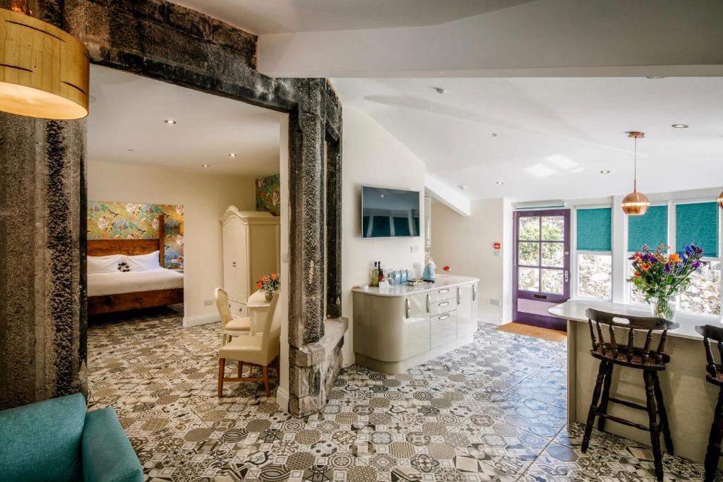 Postel nebo postele na pokoji v ubytování Grange Boutique Hotel