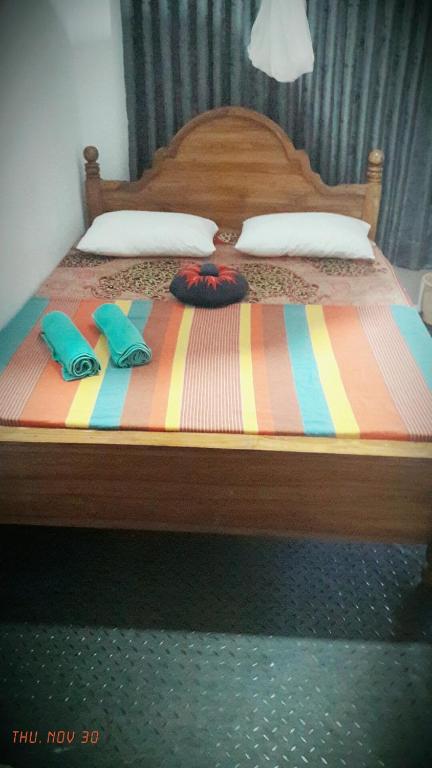 Postel nebo postele na pokoji v ubytování Relax Guest House Dambulla
