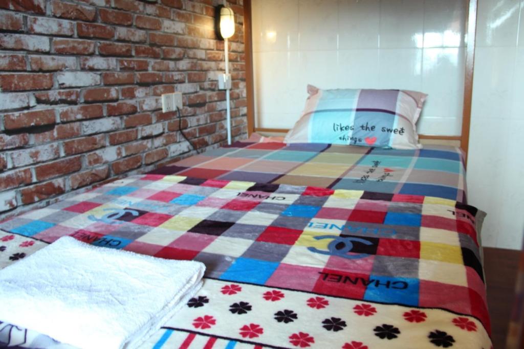 Postel nebo postele na pokoji v ubytování Pich Guesthouse