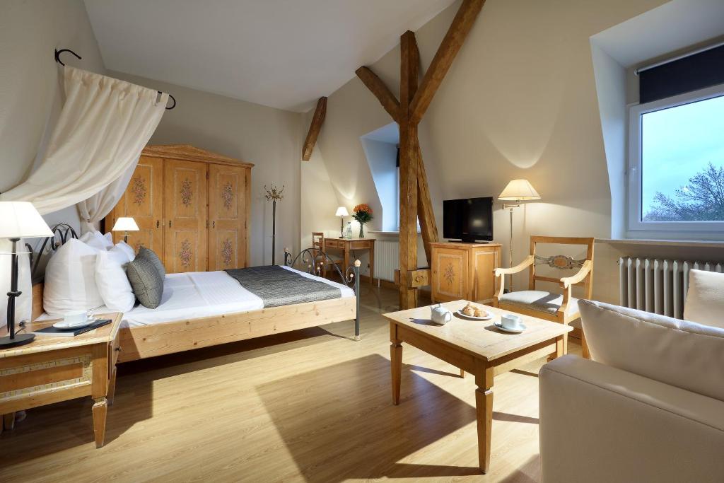Postel nebo postele na pokoji v ubytování Eurostars Park Hotel Maximilian