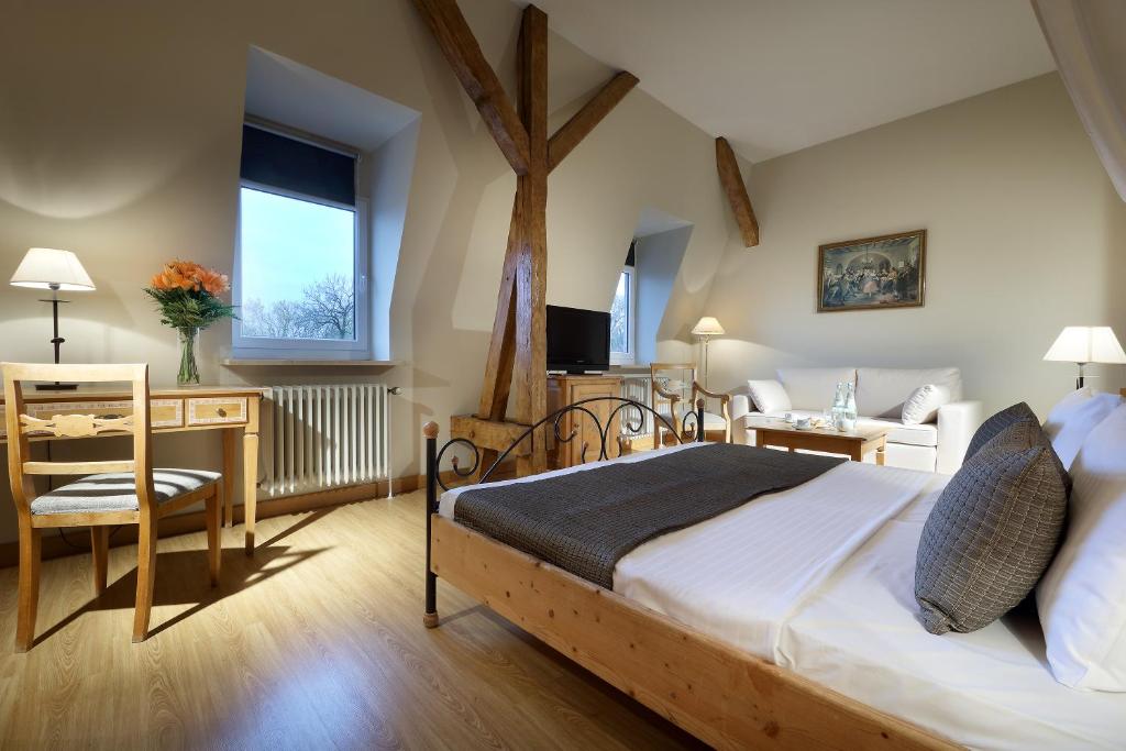 Postel nebo postele na pokoji v ubytování Eurostars Park Hotel Maximilian