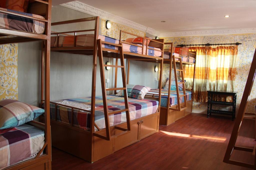 Postel nebo postele na pokoji v ubytování Pich Guesthouse