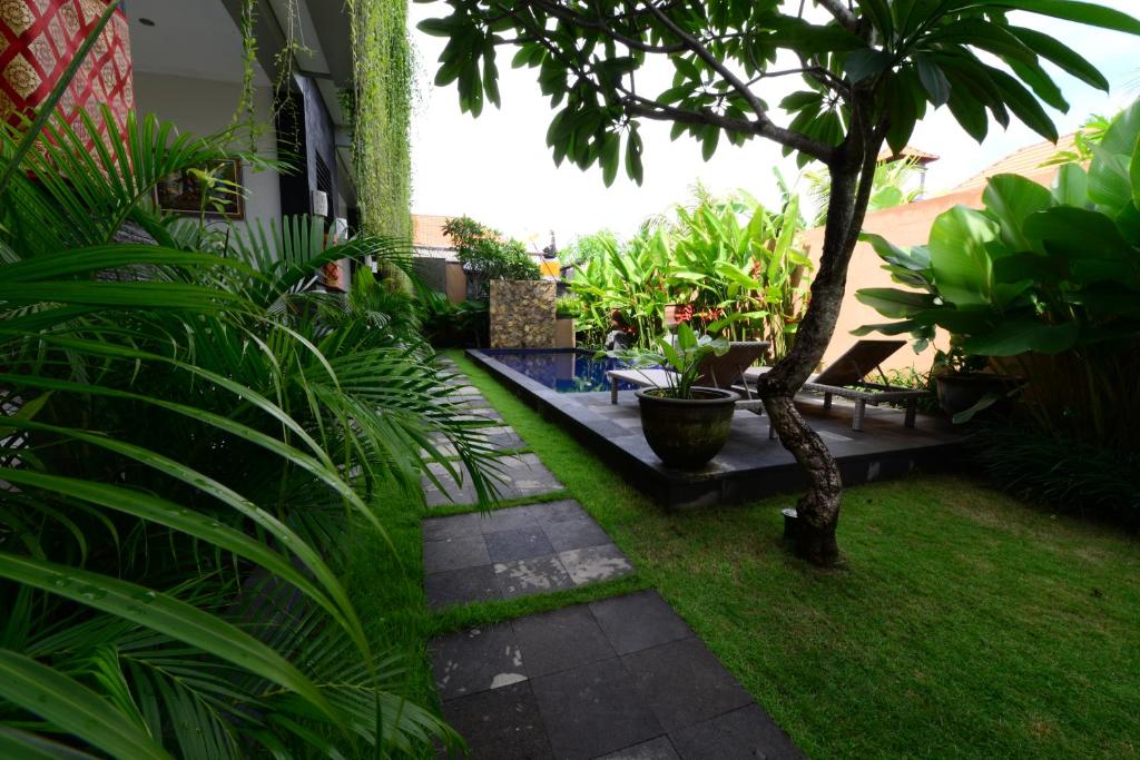 Sodas prie apgyvendinimo įstaigos Surya Guest House Sanur