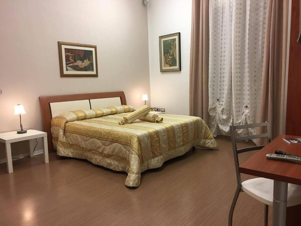 Postel nebo postele na pokoji v ubytování Aria di Casa