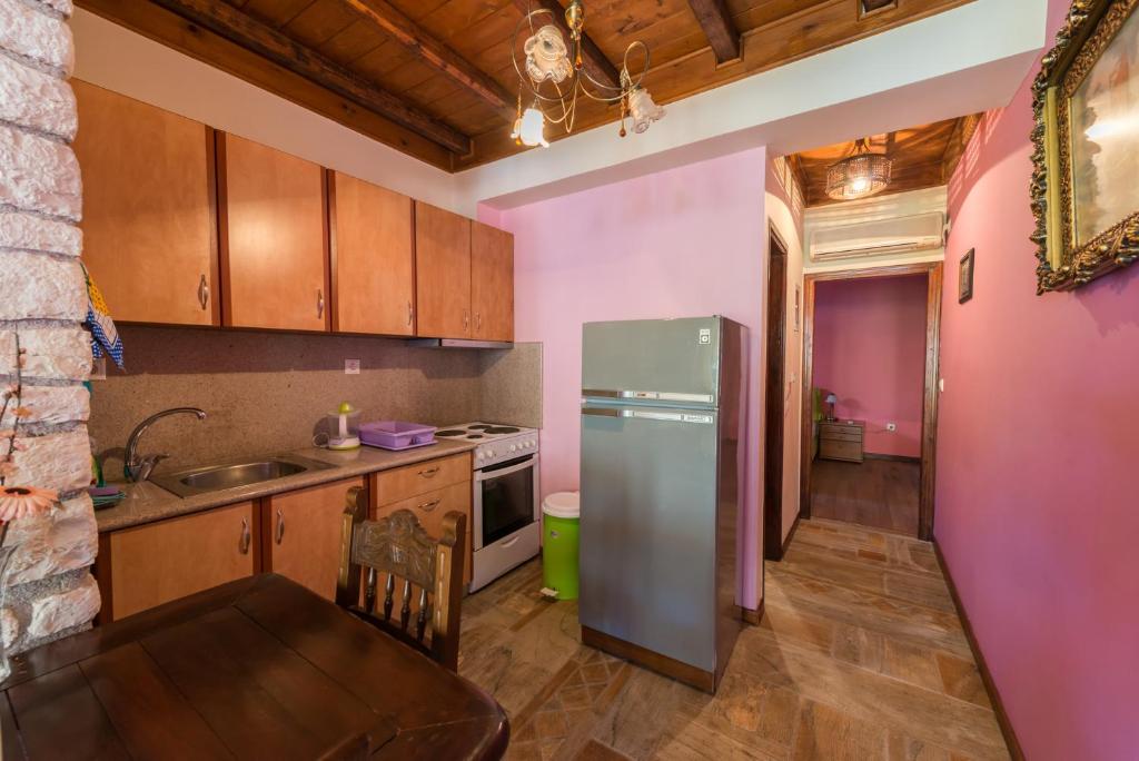 Kuchyň nebo kuchyňský kout v ubytování Luxury Stone Apartments