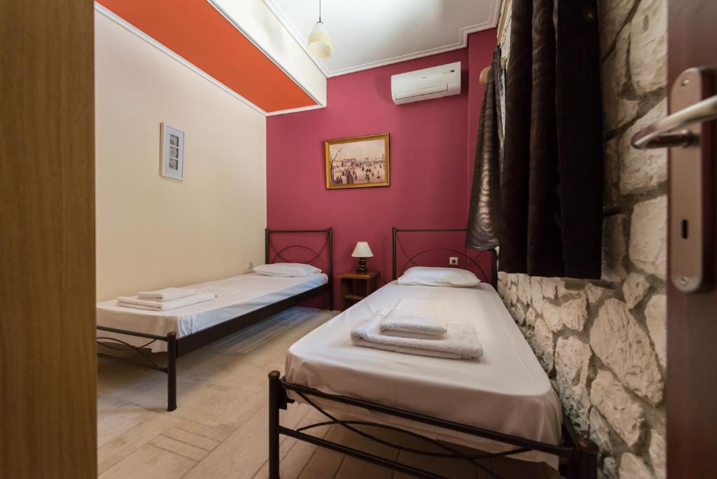 Postel nebo postele na pokoji v ubytování Luxury Stone Apartments
