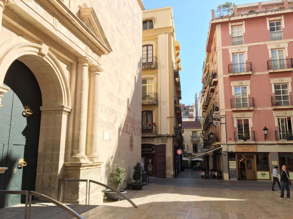 a street in a city with tall buildings at Apartment Muñoz 1 in Alicante