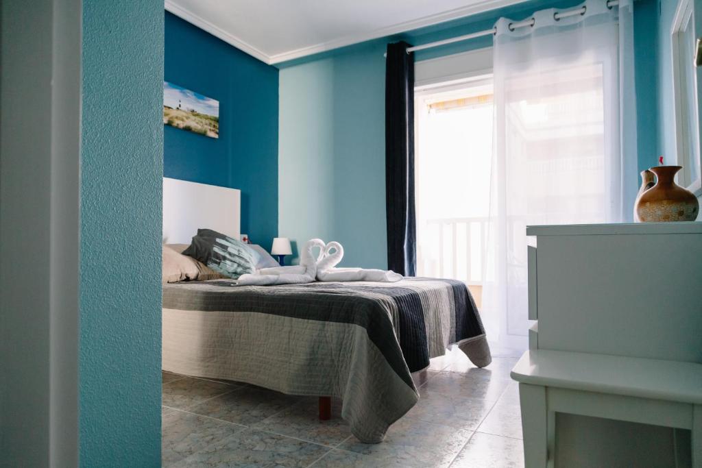 Posteľ alebo postele v izbe v ubytovaní Apartment Luz del Sol