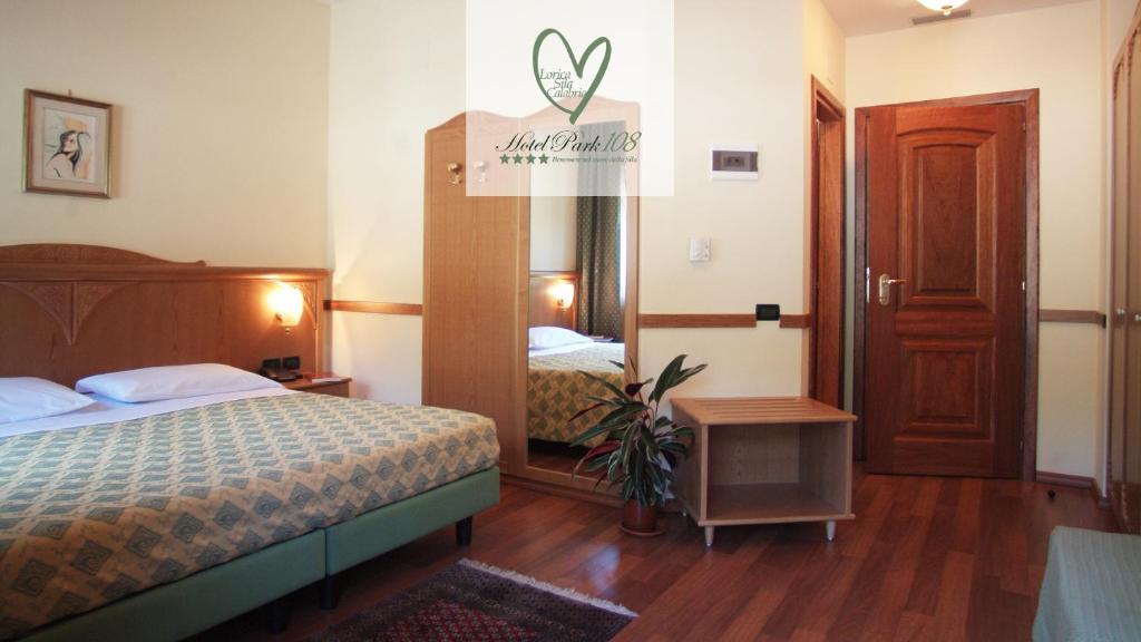 Postel nebo postele na pokoji v ubytování Hotel Park 108 Sport&Wellness
