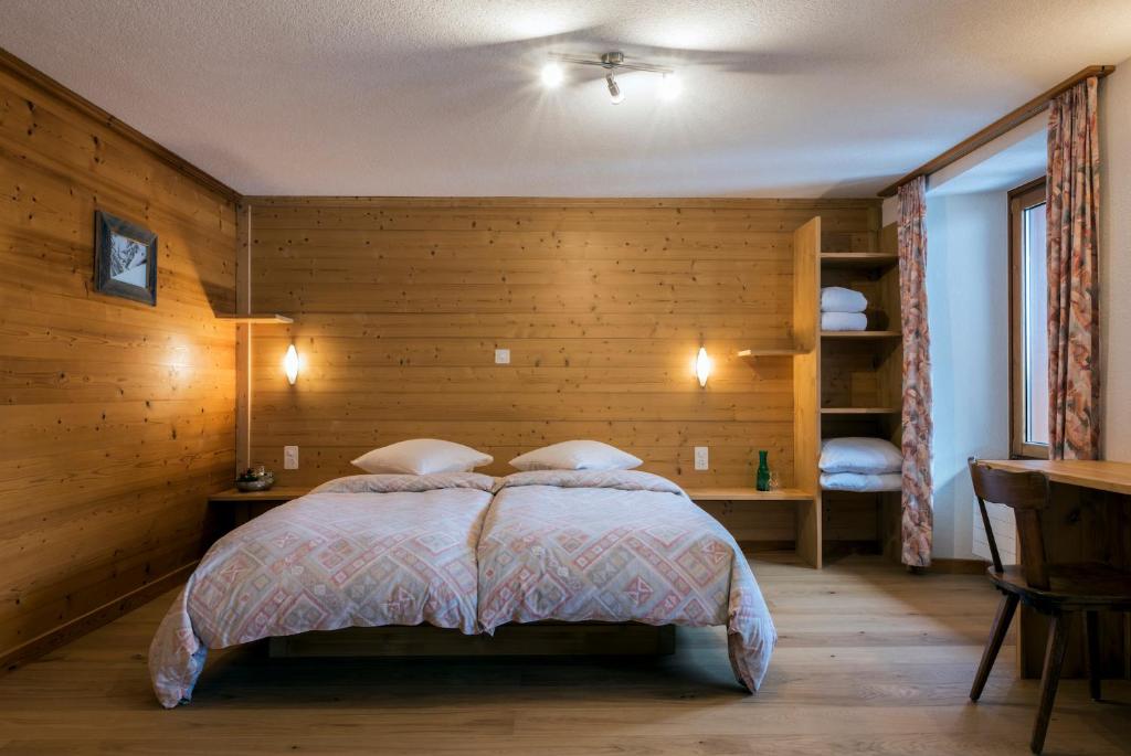 Postel nebo postele na pokoji v ubytování La Vallée Hôtel &Spa