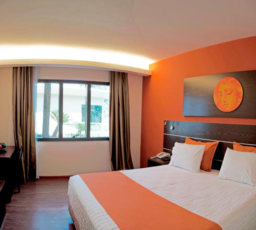 Postel nebo postele na pokoji v ubytování Awa Resort Hotel