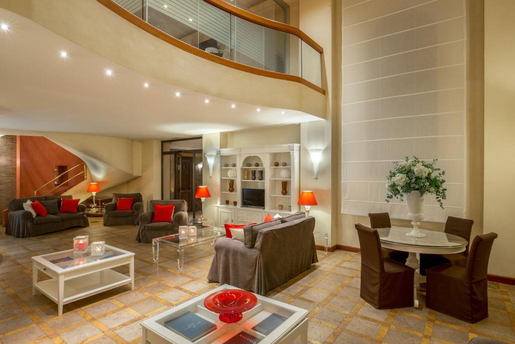 Uma área de estar em Hotel Piccolo Borgo