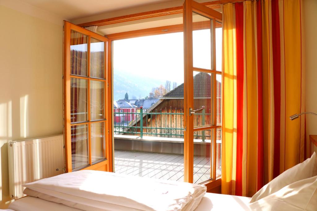 Postel nebo postele na pokoji v ubytování Hotel Binggl