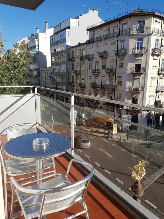 A balcony or terrace at Lisbon City Hotel by City Hotels