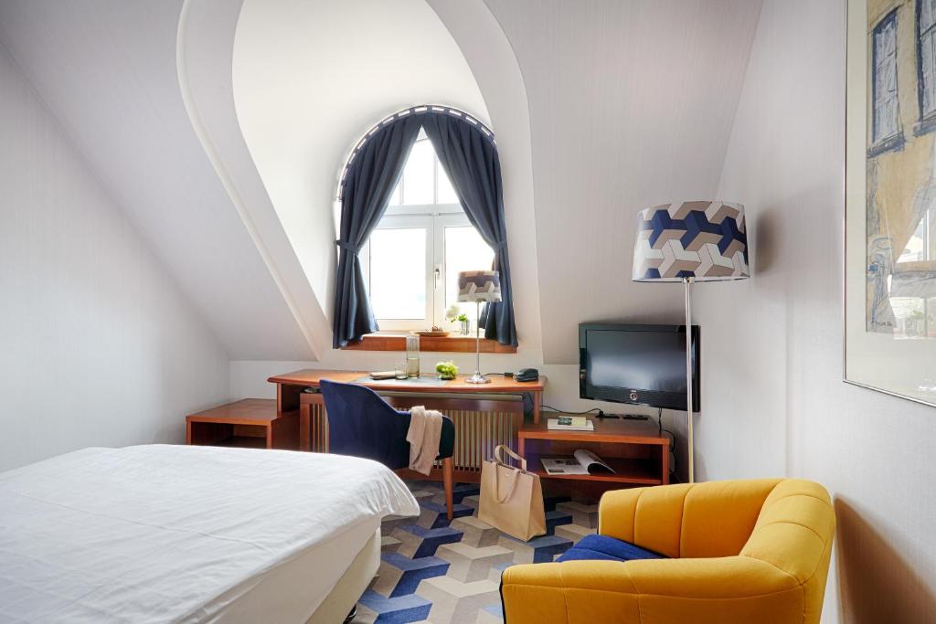 TV a/nebo společenská místnost v ubytování Seaside Park Hotel Leipzig