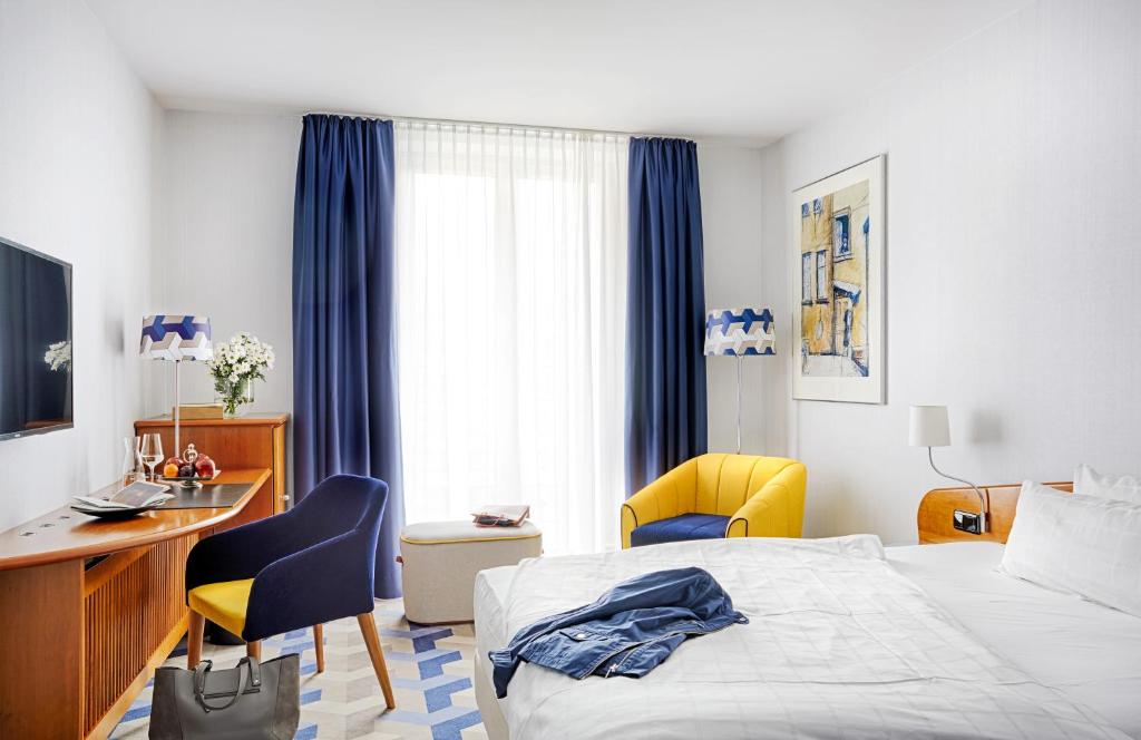 Postel nebo postele na pokoji v ubytování Seaside Park Hotel Leipzig
