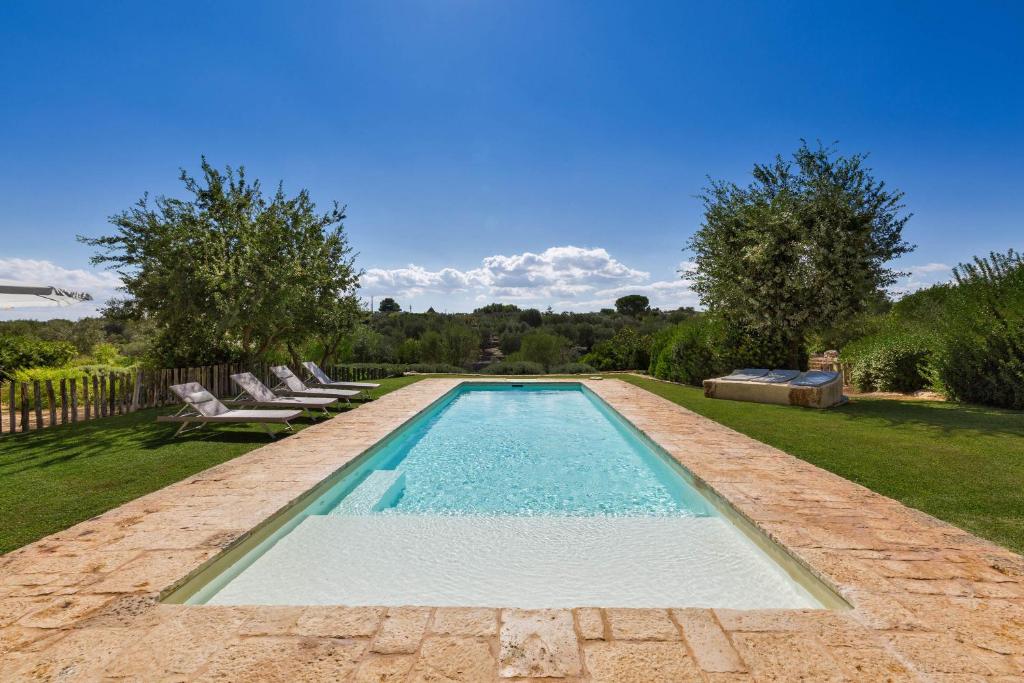 The swimming pool at or close to Trullo Luna by BarbarHouse
