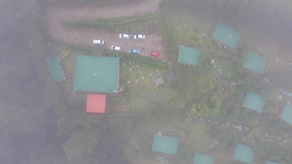 an overhead view of a parking lot with trucks at Alla Arriba in Las Cruces