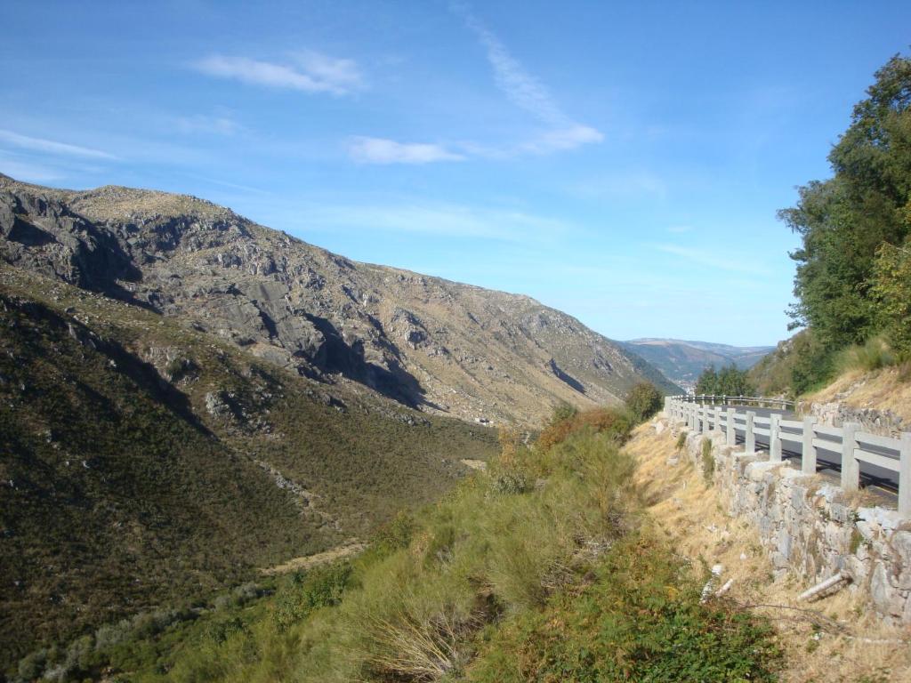 a view of a mountain from a road at A Primeira Casinha do Mé-Mé in Manteigas