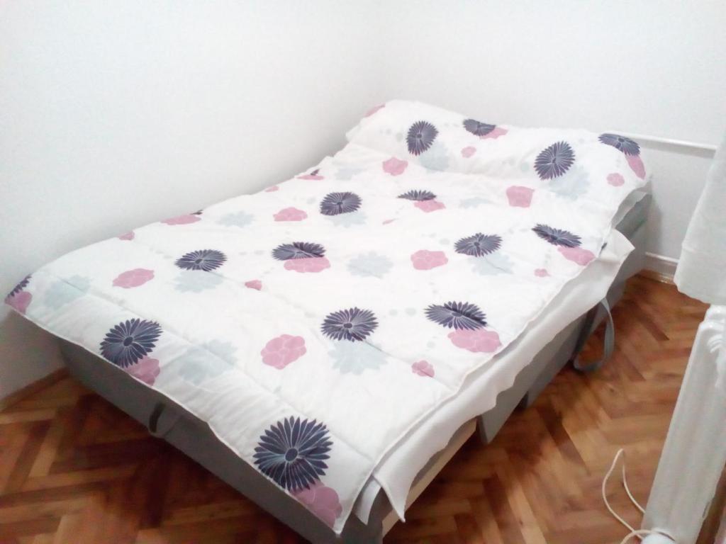 Postel nebo postele na pokoji v ubytování Tami Apartment