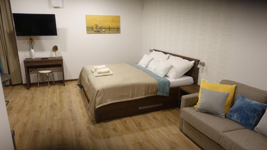 Postel nebo postele na pokoji v ubytování Apartmánový Dom Kriváň