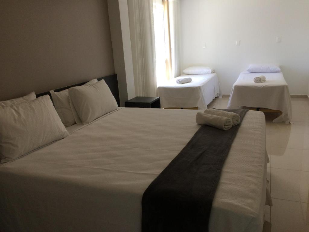 Cama ou camas em um quarto em Scenarium Hotel