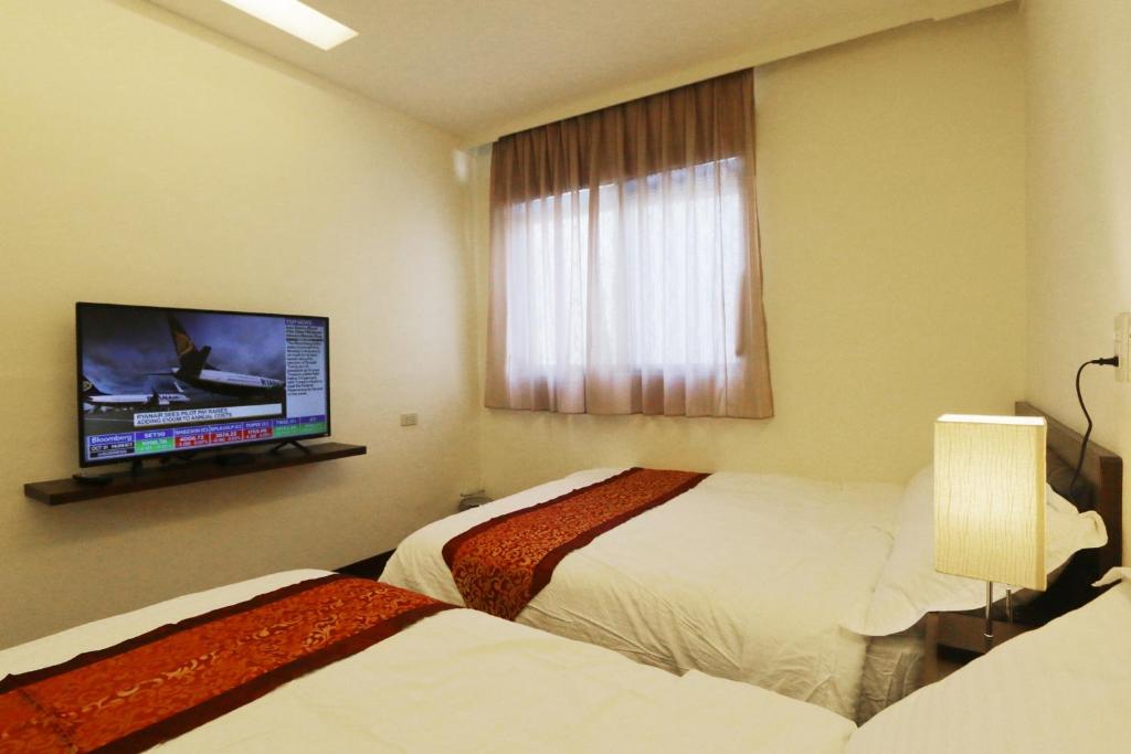 Flower Homestay - Standaard Viervoudige Kamer
